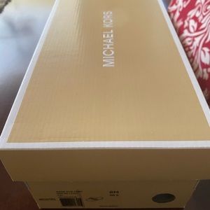 Michael Kors Gage Flip Flops.